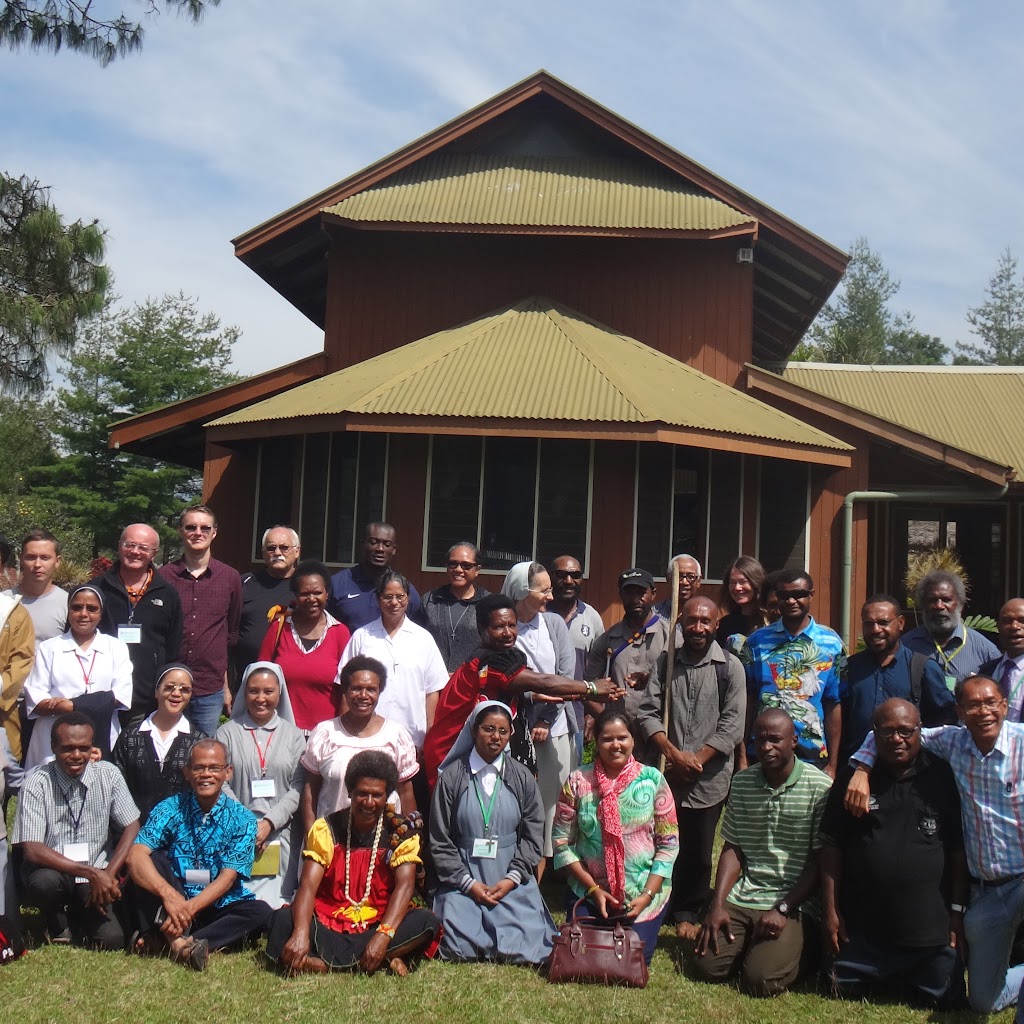 Staff and participants gathered outside the Melanesian Institute in Goroka