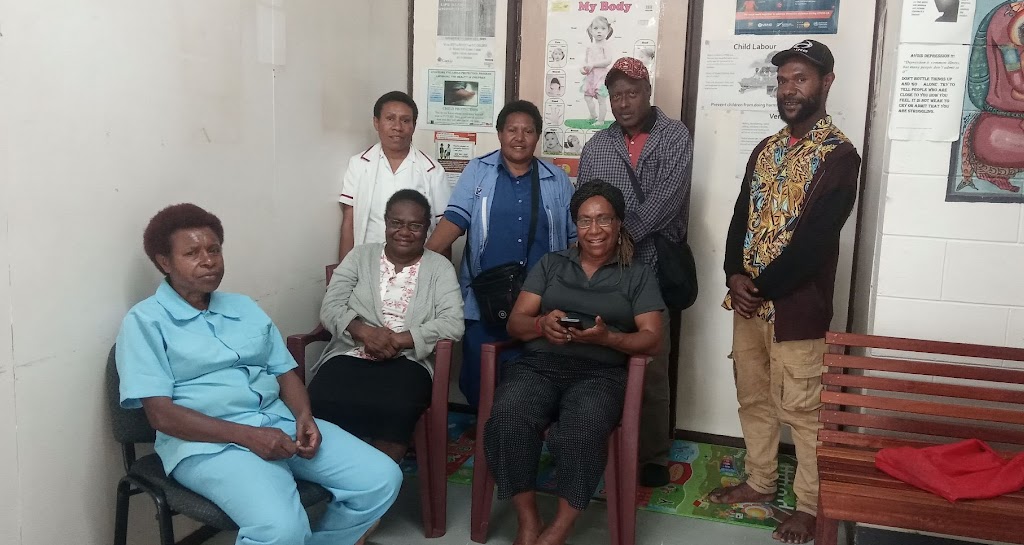 The Melanesian Institute research team with health-centre staff and community members in Simbu Province.